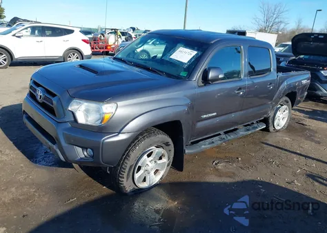 2015 Toyota Tacoma Base V6 из США, поврежденный, VIN 3TMLU4EN9FM198841